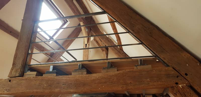 Décapage ^par aérogommage de charpente